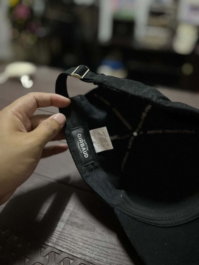 Marithe Francois Girbaud Black Cap with Purple Embroidery (Category: Caps & Hats) located in Caloocan City. Submitted by savastrid (Listing ID 1470595057, Image 2). Description: - Brand: Marithé François Girbaud Paris - Color: Black with distinct purple embroidered text patch - Material: Solid cotton-blend fabric - Design: Classic curved brim with an adjustable strap for a custom fit - Condition: Brand new / Excellent everyday casual headwear - S