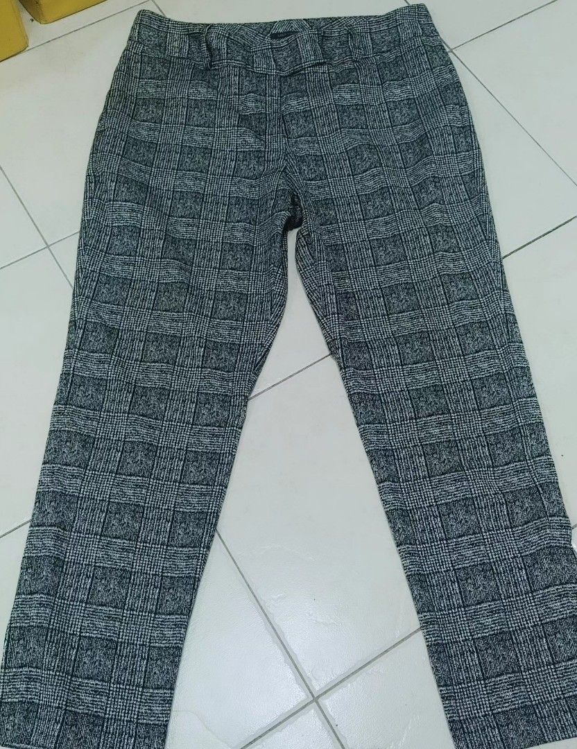 Marks & Spencer Grey Check Tailored Trousers (Category: Trousers) located in Quezon City. Submitted by chph3rd (Listing ID 1470637737, Image 3). Description: - Brand: Marks & Spencer - Item: Grey check tailored trousers - Design: Classic plaid pattern with structured waistband - Condition: Clean overall - Style Tip: Great for office wear or formal occasions; pair with a crisp white shirt and blazer.