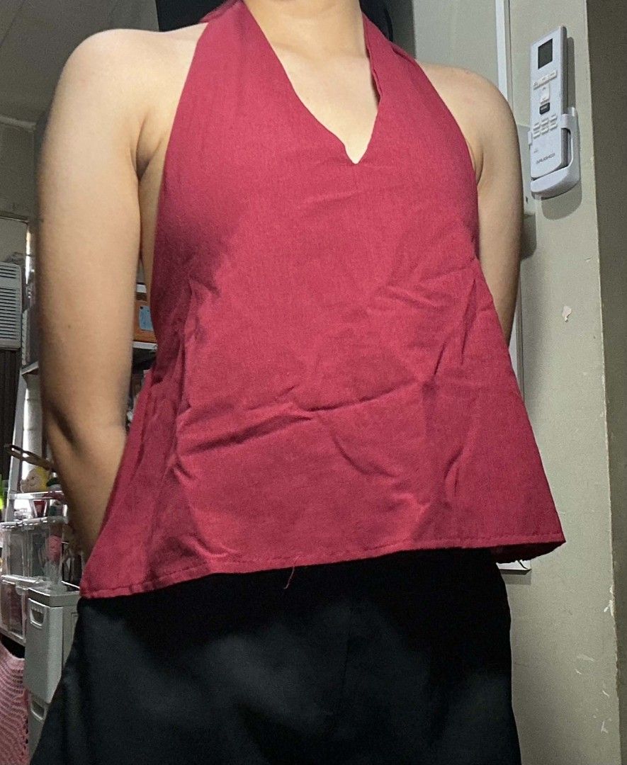 Maroon Halter Semi Backless Top (Category: Sleeveless) located in Mandaluyong City. Submitted by lovedbychiena (Listing ID 1470676735, Image 1). Description: Size: Small to Medium 📩 Message for more information/size clarifications 📍Mandaluyong City 💸 Gcash/BPI 🚚 Jnt / Lalamove /Pick-up.