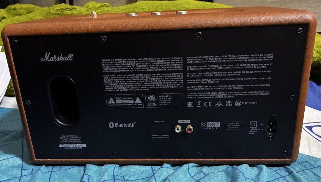 Marshall Stanmore III Bluetooth Speaker Brown (Category: Soundbars, Speakers & Amplifiers) located in Taguig. Submitted by mhalet.902 (Listing ID 1470561031, Image 3). Description: - Authentic Marshall Stanmore III home speaker in a stylish brown leather finish - Iconic gold control panel with tactile brass knobs for volume, bass, and treble tuning - Equipped with source button, media controls, and a classic power toggle switch - Features a rear 