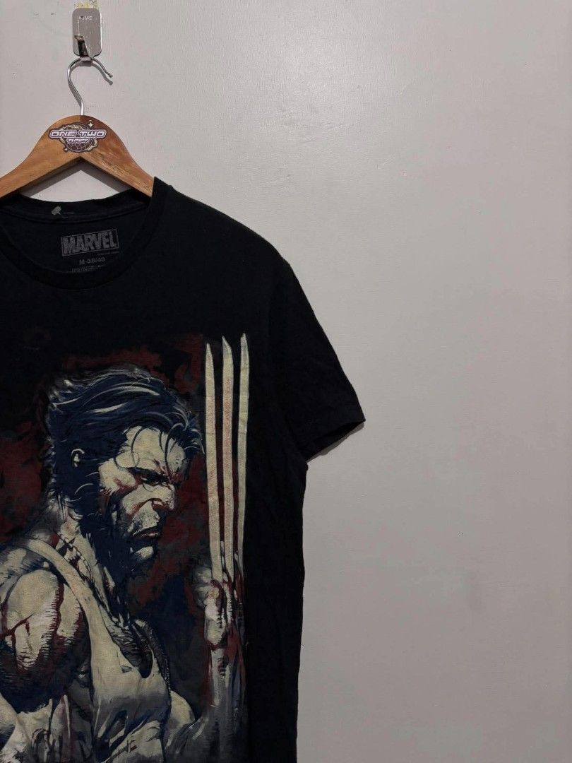 Marvel Wolverine Big print Shirt (Category: Tshirts & Polo Shirts ) located in Bauan. Submitted by onetwothrift2 (Listing ID 1470658542, Image 2). Description: Marvel Wolverine Big print Shirt Size: Medium- Large Dimes: L27.5 W20.5 Color rate: 10/10 As new condition No issue.