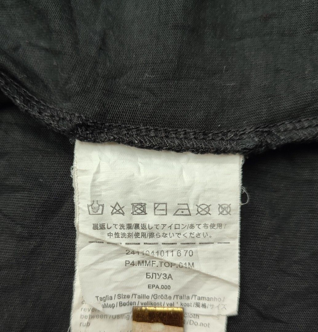 Max Mara Colibri Printed Shirt (Category: Shirts) located in Bayambang. Submitted by mon10192816 (Listing ID 1470647793, Image 3). Description: - Width - 18 - Length - 25.5 - Brand: MaxMara - Color: Black - Style: Short-sleeve t-shirt with round ribbed neckline - Design: Math formulas graphic print on front with MM 1951 logo patch - Size: Refer to internal tag.