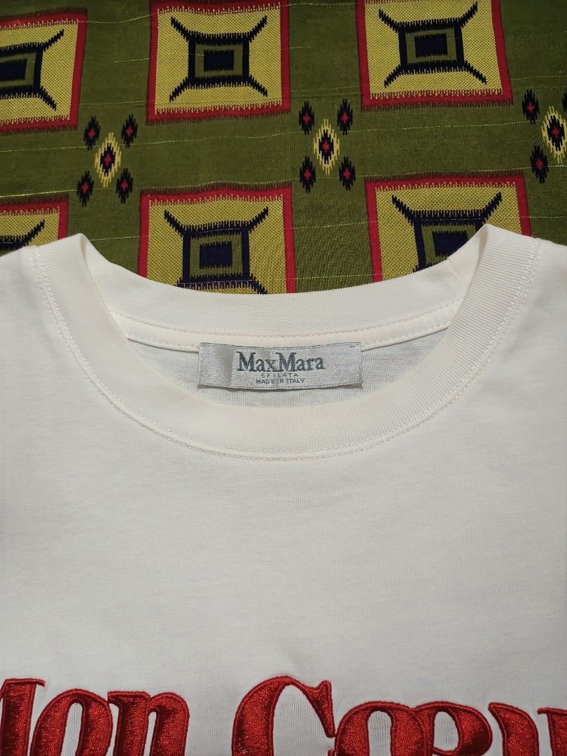 MaxMara Embroidered Mon Coeur White Tee (Category: Tshirts & Polo Shirts ) located in Lapu Lapu. Submitted by rebuild.arkives (Listing ID 1470621653, Image 3). Description: MaxMara Embroidered Mon Coeur White Tee ‎ ‎📏 Size Guide (Inches): ‎Length: 28 ‎Width: 20.5 ‎ ‎Color: 10/10 ‎Condition: 10/10 ‎Issue: None ‎ ‎📝 Heads up: ‎• This is a thrift item so please manage your expectations. ‎• Color may slightly differ due to lighting. ‎• Washed and r