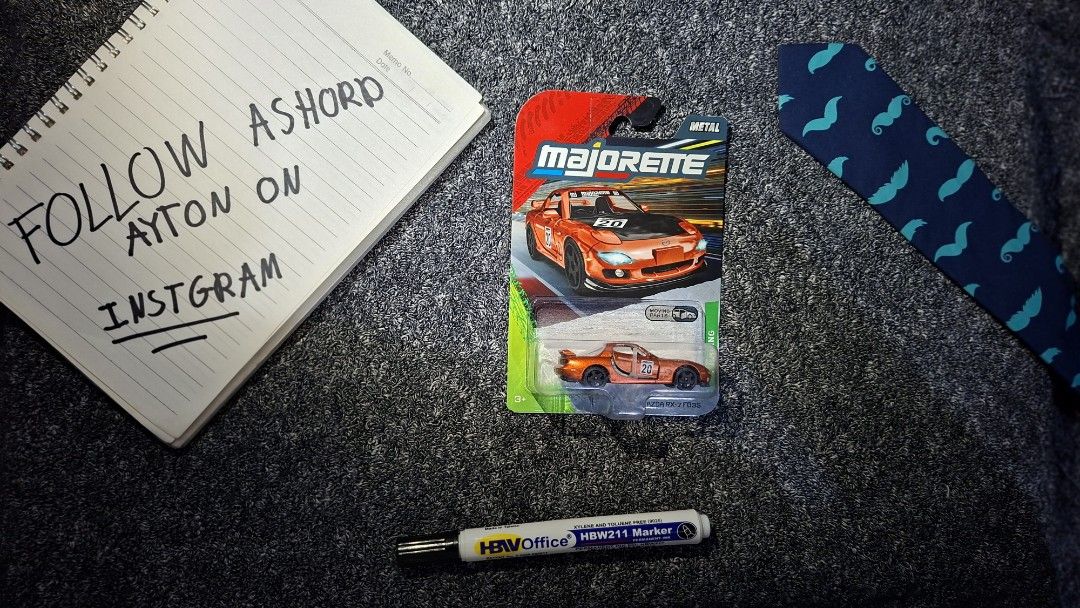 Mazda RX-7 (Category: Vehicle & Diecast Models) located in Manila. Submitted by ashford_ayton (Listing ID 1470666080, Image 1). Description: sealed Majorette Mazda RX-7 FD3S! 🏎️ This is a premium diecast with amazing details, including an opening door ("Moving Parts"). Finished in a stunning metallic orange with racing decals (#20). A must-have for JDM and rotary enthusiasts. Condition: Brand new, sealed in card (Mint)..