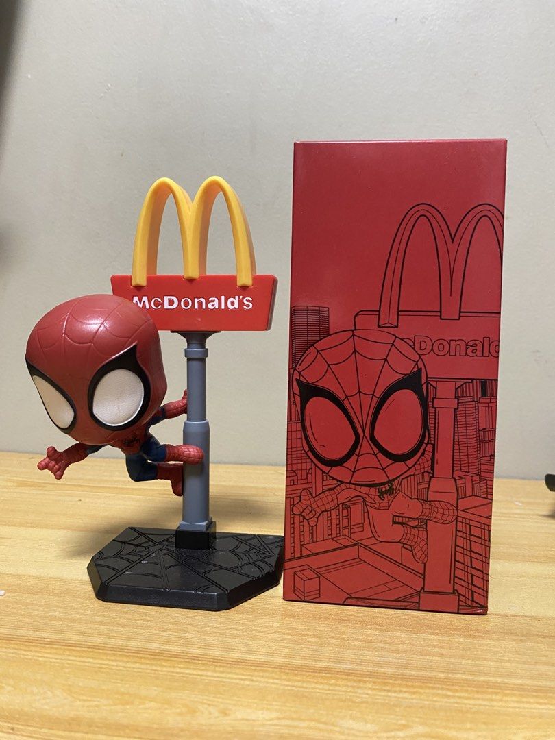 McDonald's Spider-Man Figure with Box (Category: Figurines & Statues) located in Manila. Submitted by ianxr (Listing ID 1470678046, Image 1). Description: Brand new, unopened McDonald's x Spider-Man collectible figure. Comes with a street sign stand and original red/black packaging box. Perfect for display!.