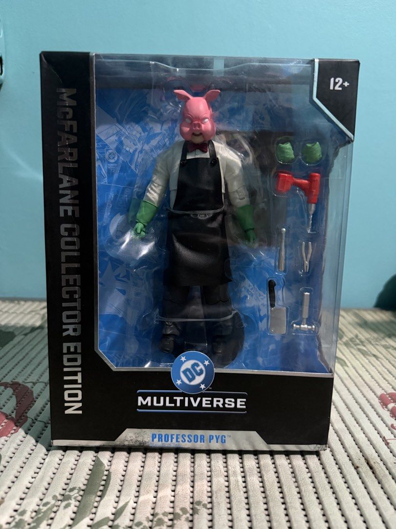 McFarlane Toys DC Multiverse Professor Pyg Collector Edition (Category: Figurines & Statues) located in Cavite. Submitted by czymondegu04016 (Listing ID 1470689193, Image 1). Description: - Brand: McFarlane Toys (DC Multiverse Collector Edition) - Character: Professor Pyg - Condition: Brand new, factory-sealed, unopened window box with minimal shelf wear - Included Accessories: Miniature butcher tools, cleaver, drill, and interchangeable hands - 