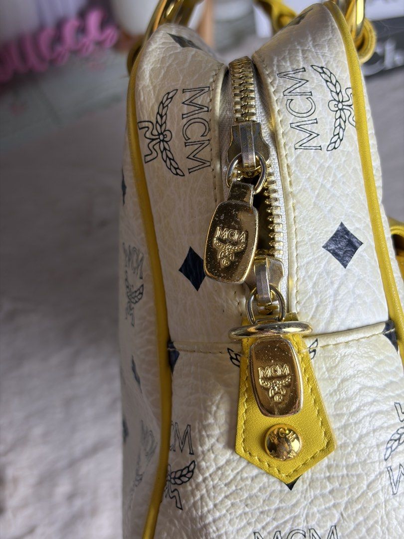 MCM YELLOW HAND BAG (Category: Luxury Bags & Wallets) located in Manila. Submitted by at_realty (Listing ID 1470638632, Image 2). Description: MCM YELLOW HAND BAG 9/10 condition .