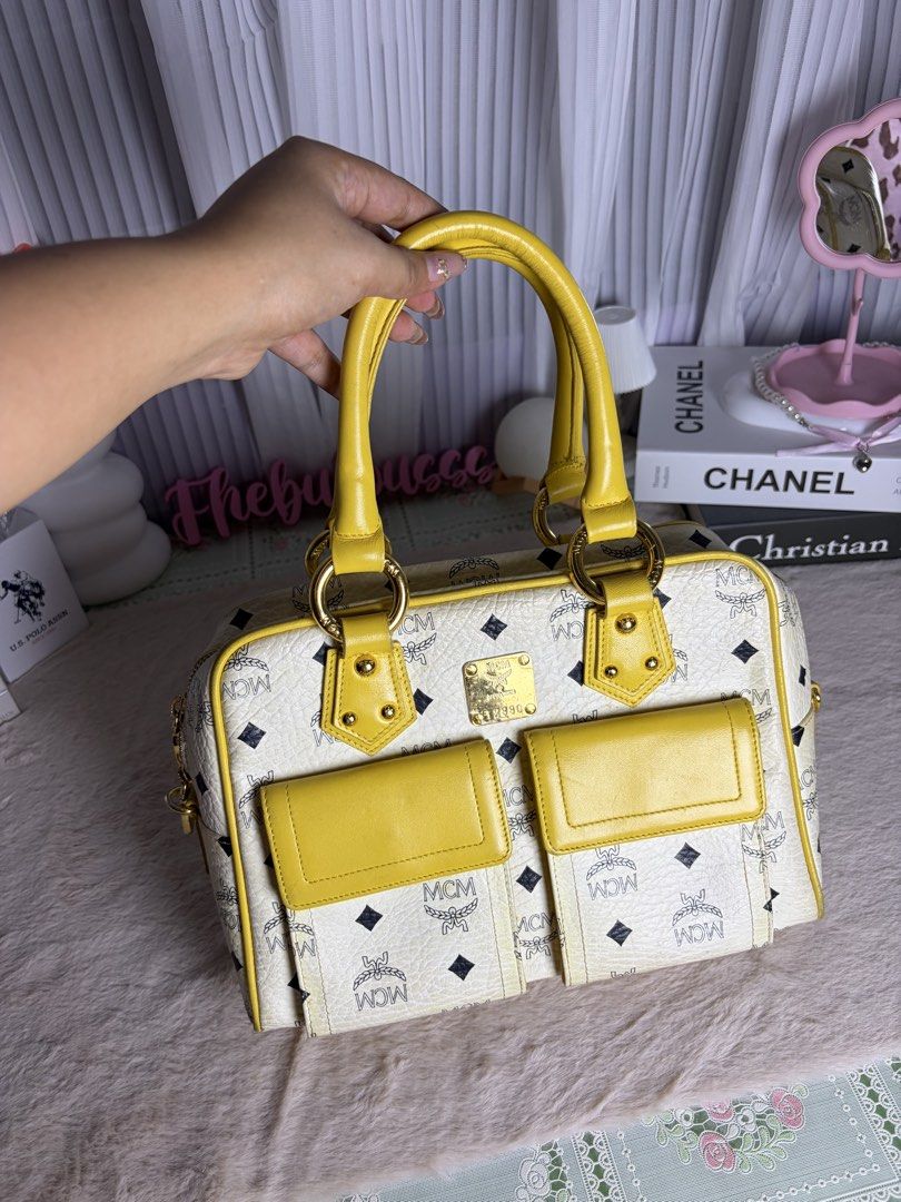 MCM YELLOW HAND BAG (Category: Luxury Bags & Wallets) located in Manila. Submitted by at_realty (Listing ID 1470638632, Image 1). Description: MCM YELLOW HAND BAG 9/10 condition .