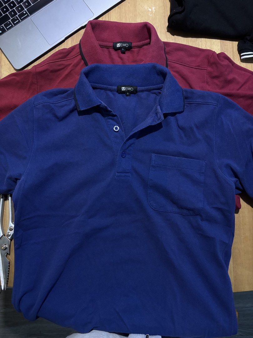 MEMO Blue Polo Shirt Size S (Category: Tshirts & Polo Shirts ) located in Manila. Submitted by ninja2130 (Listing ID 1470588466, Image 1). Description: - Brand: MEMO - Size: S - Material: Soft cotton - Fit: Standard fit - Design: Classic collar with dark blue trim, front buttons, and a chest pocket - Style: Casual, versatile, and easy to pair with jeans or shorts 500 as pack only‼️.