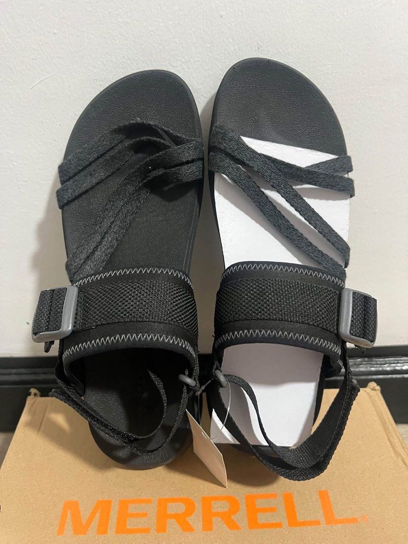 Merrell Black Sandals (Category: Flats & Sandals) located in Baguio. Submitted by heath2600 (Listing ID 1470590596, Image 1). Description: - Color: Black - Adjustable straps with secure buckled heel closure - Textured footbed for maximum grip and comfort - Comes with original paper inserts still tucked inside.