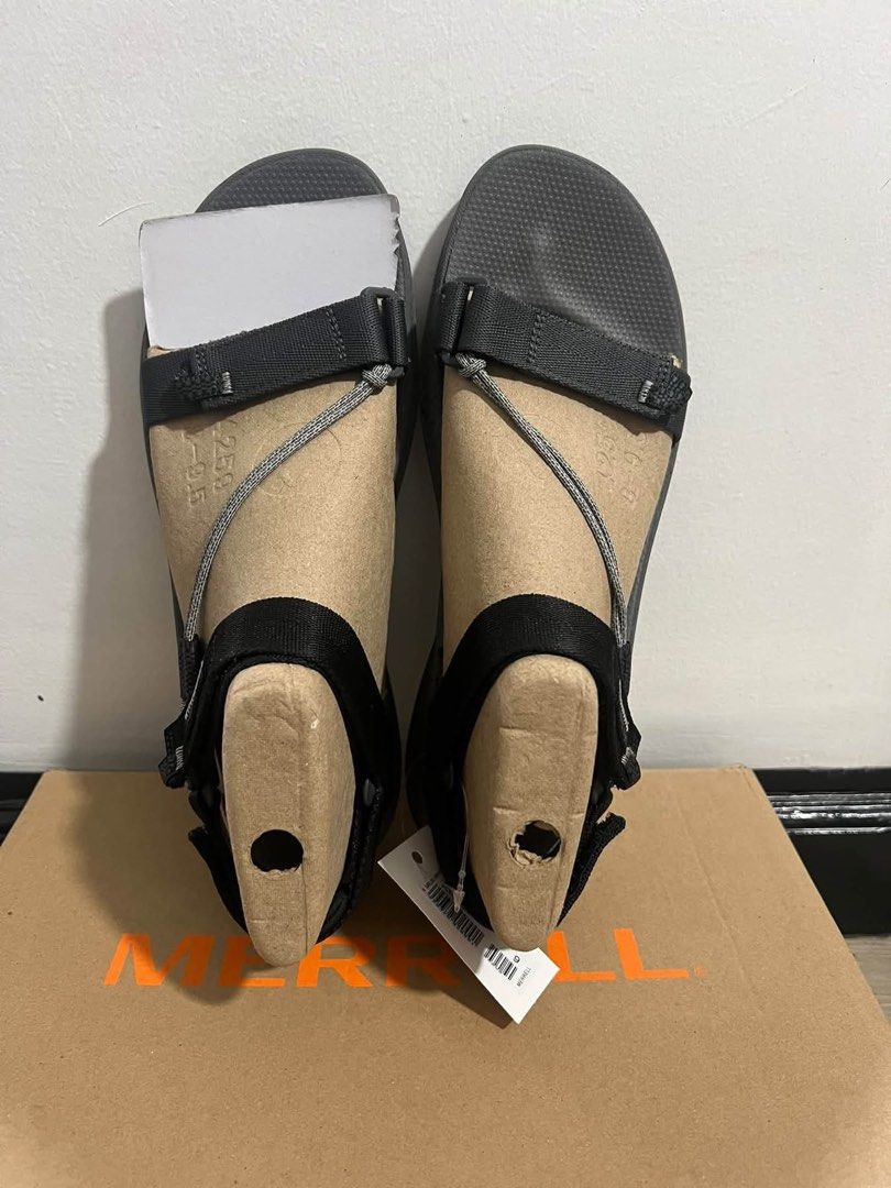 Merrell Black Strap Sandals (Category: Flats & Sandals) located in Baguio. Submitted by heath2600 (Listing ID 1470590478, Image 1). Description: - Brand: Merrell - Color: Black with grey cord accent - Condition: Brand new with tags and original shoebox - Features: Adjustable straps and textured footbeds - Inclusion: Cardboard shoe inserts included.