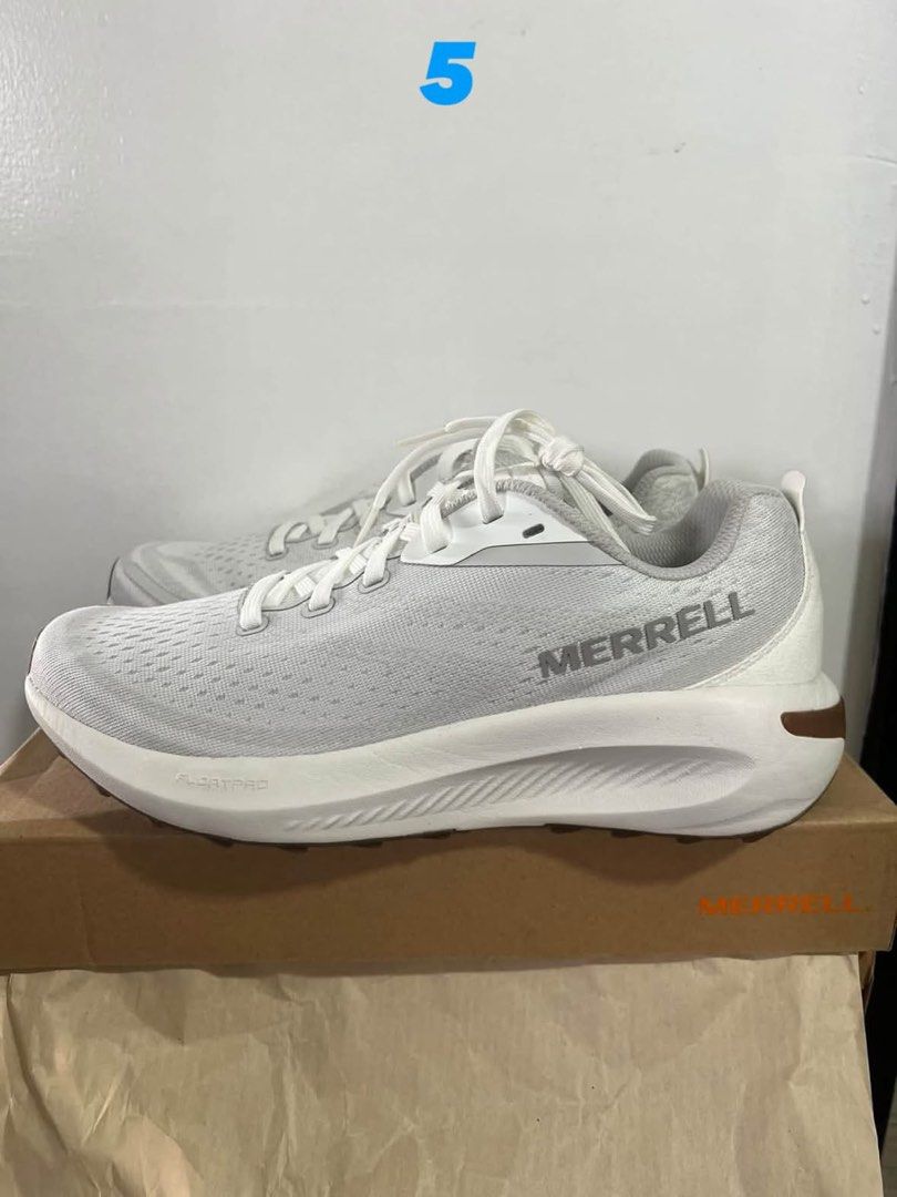 Merrell FloatPro White Running Shoes (Category: Sneakers) located in Baguio. Submitted by heath2600 (Listing ID 1470581515, Image 1). Description: - Authentic Merrell running shoes in a clean white and light grey colorway - Lightweight FloatPro foam midsole for exceptional cushioning and comfort - Breathable mesh upper keeps your feet cool on the run - Secure lace-up closure for a locked-in, snug fit - Stylish branded text detail on the side - In
