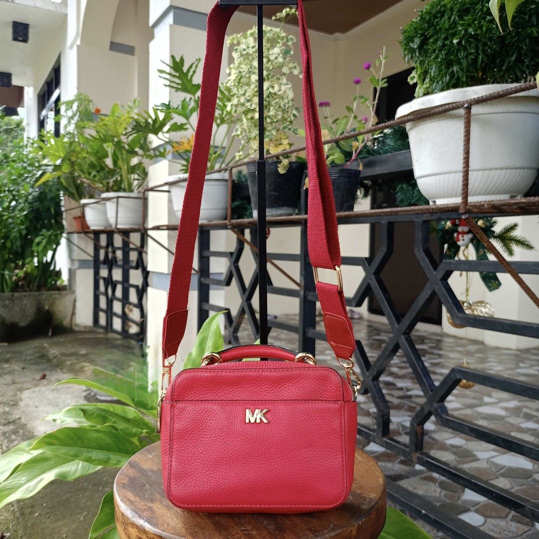 Michael Kors Mott mini pebbled leather red (Category: Cross-body Bags) located in Barugo. Submitted by green.trendsetter (Listing ID 1470567029, Image 1). Description: PRELOVED MEANS PRELOVED. Each piece has been previously loved and may naturally have signs of use such as creasing, scratches, stains, discoloration, or other imperfections. Kindly manage your expectations accordingly. •We kindly ask for no fussy buyers. • Photos of bag’s details a