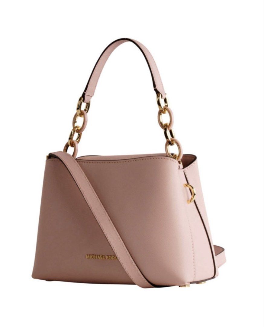 Michael Kors small portia 2-way bag (Category: Cross-body Bags) located in Barugo. Submitted by green.trendsetter (Listing ID 1470567655, Image 1). Description: PRELOVED MEANS PRELOVED. Each piece has been previously loved and may naturally have signs of use such as creasing, scratches, stains, discoloration, or other imperfections. Kindly manage your expectations accordingly. •We kindly ask for no fussy buyers. • Photos of bag’s details and othe