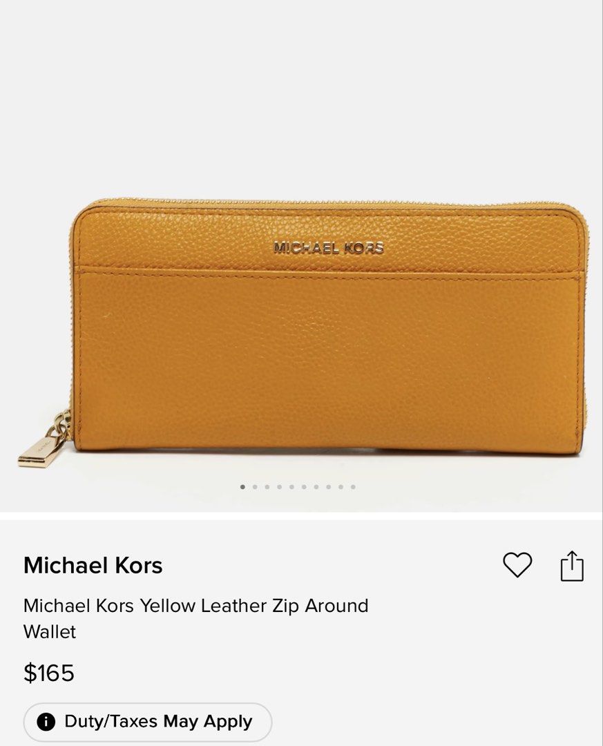 Authentic Michael Kors Yellow Leather Zip Around Wallet (Category: Wallets & Card holders) located in Manila. Submitted by jodiein67146 (Listing ID 1470715355, Image 2). Description: - Brand: Michael Kors bought from Japan - Material: Bright yellow leather - Closure: Zip-around for secure storage - Interior: Multiple card slots, slip pockets, and a zippered coin compartment - Exterior: Front pocket for quick access - Lining: Signature Michael Kor