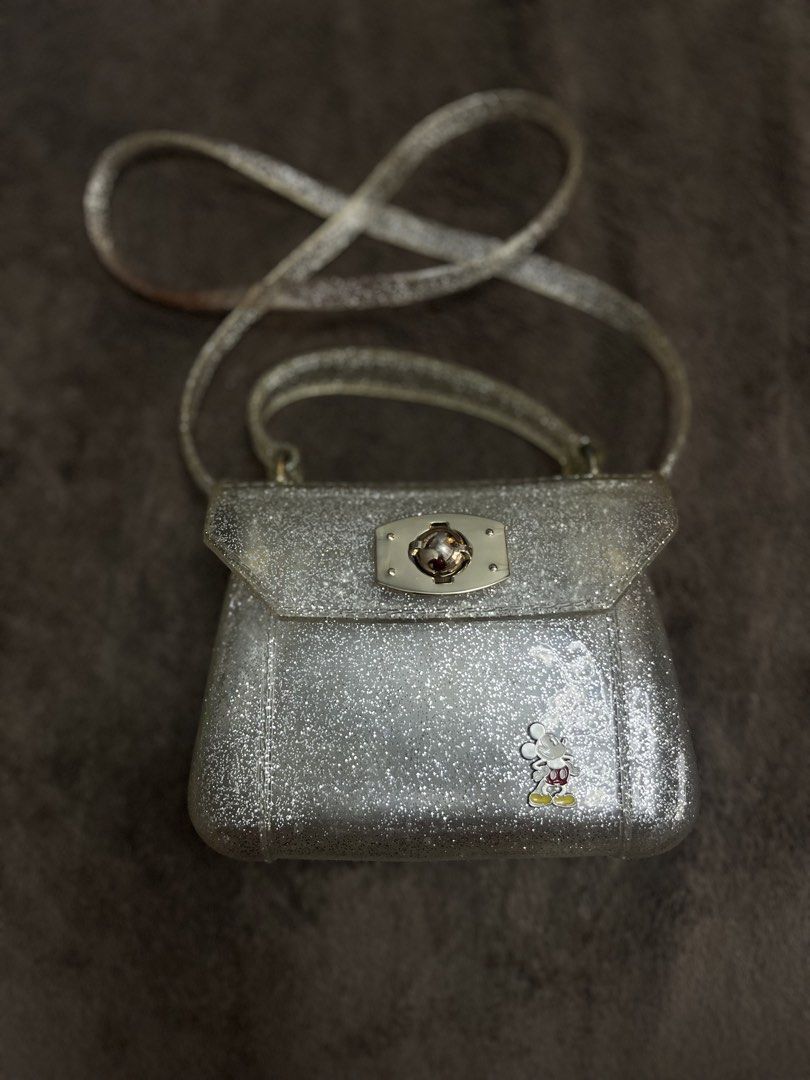 Mickey Mouse Glittery Jellybag (Category: Babies & Kids Fashion) located in Paranaque City. Submitted by regina_sy (Listing ID 1470619995, Image 1). Description: MOP: GCASH J&T Express delivery (SF c/o BUYER) NO WW photo 📍Pque MM.