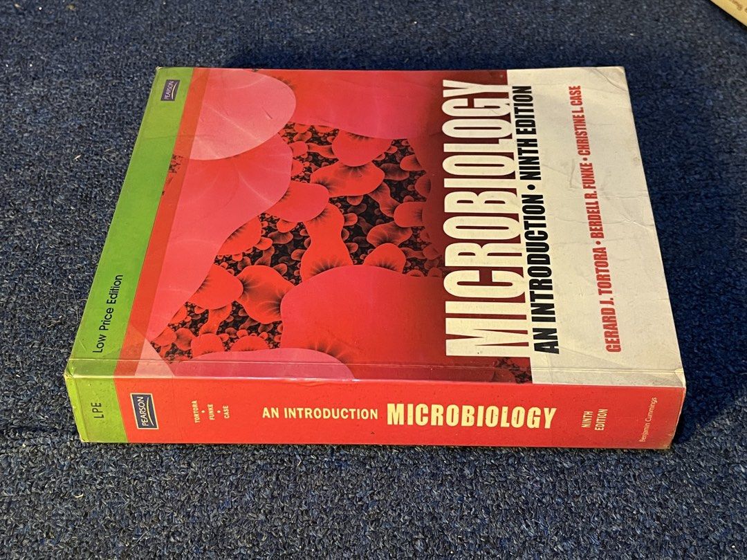 Microbiology: An Introduction Ninth Edition Textbook (Category: Textbooks) located in Pasig City. Submitted by keiisellsious (Listing ID 1470690097, Image 3). Description: Microbiology An Introduction (Ninth Edition) ₱ 150 — authorized by Gerard J. Tortora, Berdell R. Funke, and Christine L. Case; published by Pearson / C & E Publishing (Low Price Edition) — pages intact with normal shelf wear on edges and spine.