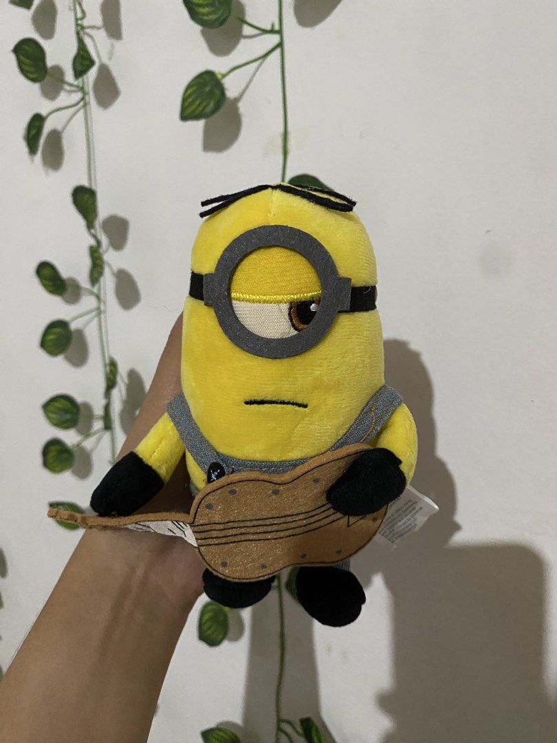 Minions Stuart playing a guitar Plush Charm (Category: Plushies & Soft Toys) located in Guagua. Submitted by toy_corner (Listing ID 1470639375, Image 2). Description: Like new No issue Pampanga loc MOP: Gcash J&T courier.