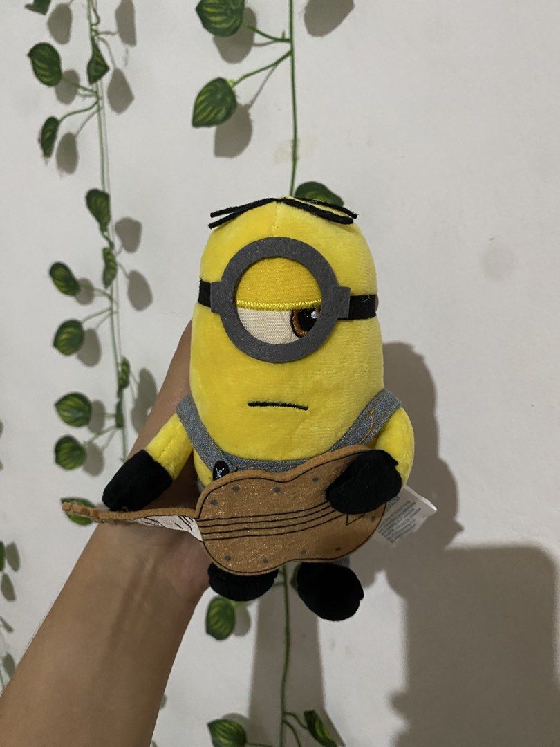 Minions Stuart playing a guitar Plush Charm (Category: Plushies & Soft Toys) located in Guagua. Submitted by toy_corner (Listing ID 1470639375, Image 1). Description: Like new No issue Pampanga loc MOP: Gcash J&T courier.