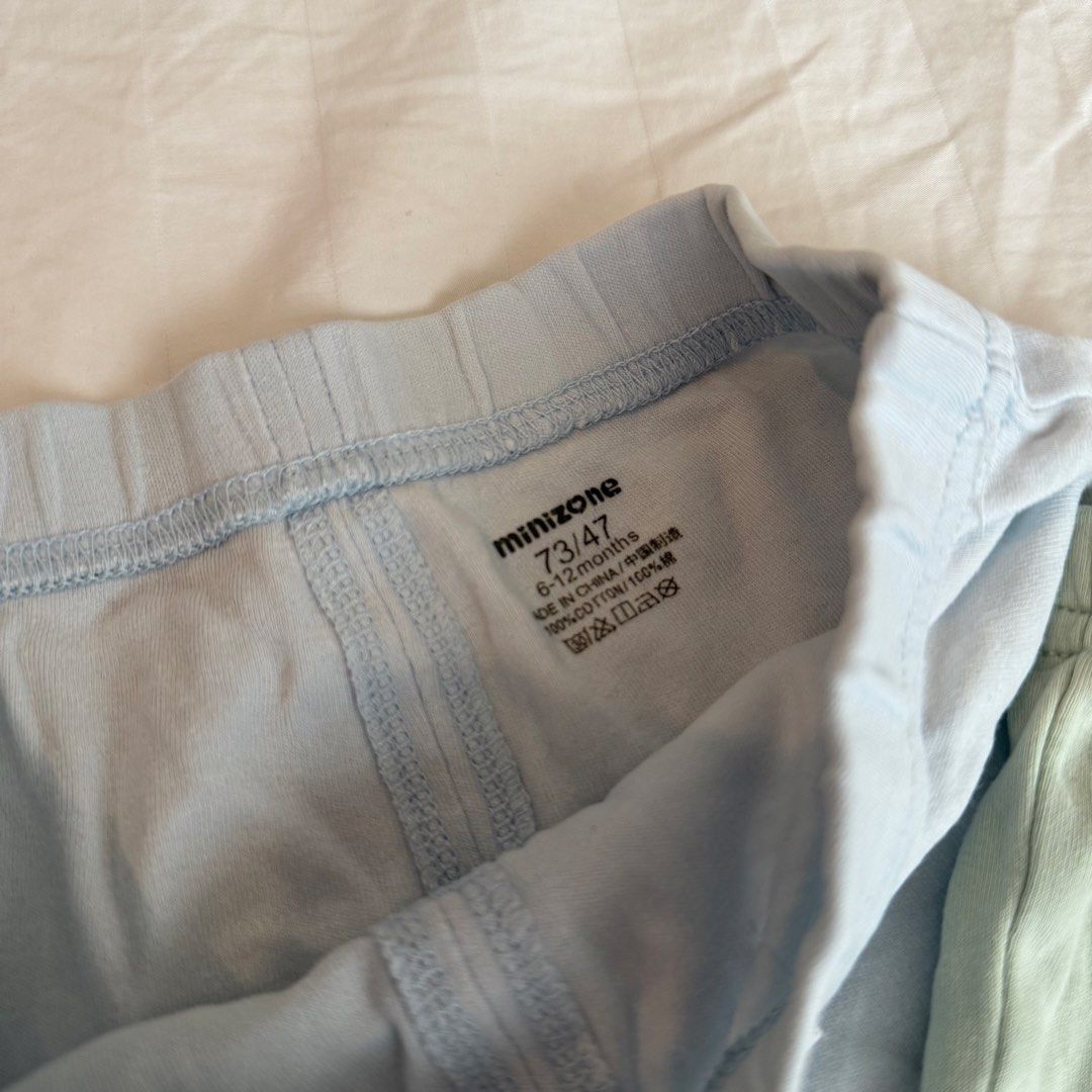 Minizone Baby Shorts Bundle 6-12 Months (Category: Babies & Kids Fashion) located in Marikina City. Submitted by lovegoeson (Listing ID 1470693266, Image 2). Description: - Brand: Minizone - Bundle of 2 pairs: Light blue and sage green - Material: 100% soft and breathable cotton - Size: 73/47 (fits 6 to 12 months) my baby wore this until he’s 2yrs old - Features: Elastic waistband with cute decorative drawstring - Condition: Clean, excellent pre-