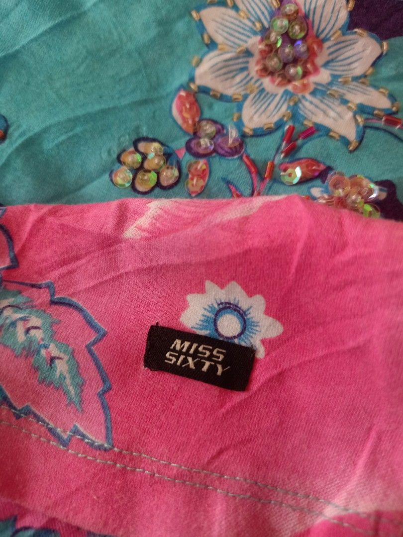 Miss sixty tops (Category: Sleeveless) located in Davao. Submitted by yakult_thrift56 (Listing ID 1470731136, Image 3). Description: excellent condition non Issues need wash only.