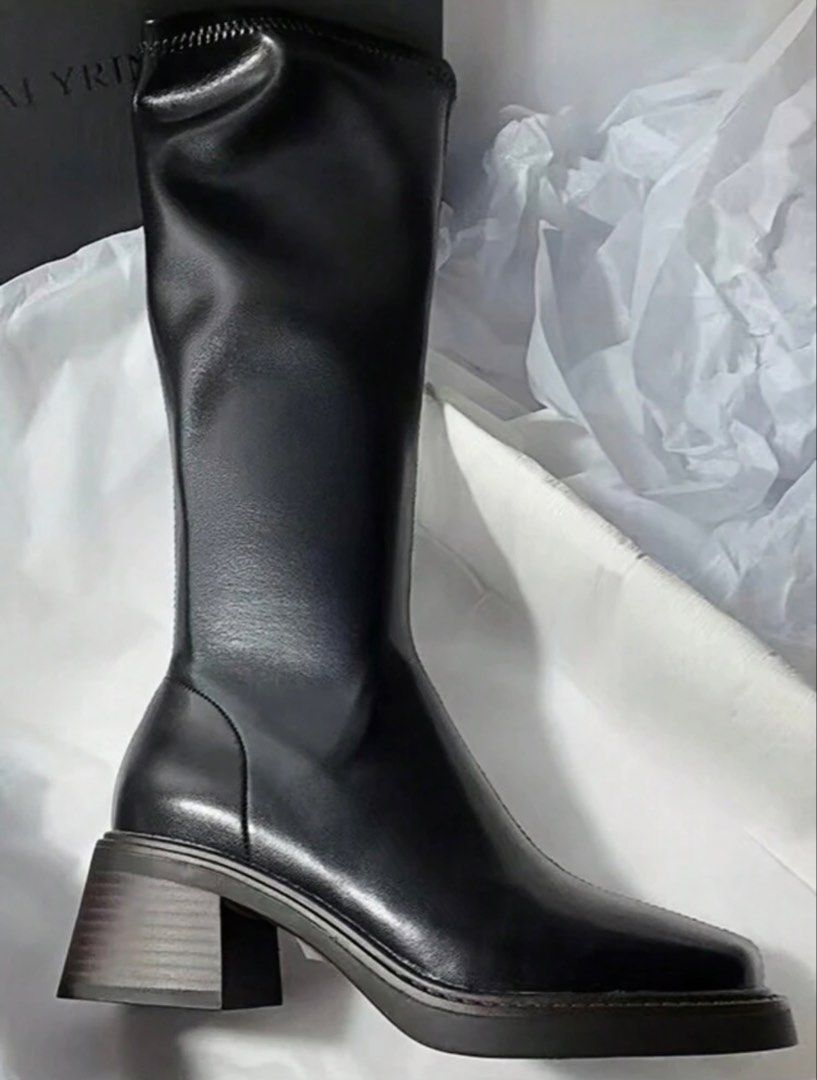 Black Knee-High Boots Block Heel (Category: Boots) located in Makati City. Submitted by closetcleanuph (Listing ID 1470662702, Image 3). Description: - Brand: Missmi - Color: Black - Style: Knee-high boots with a trendy square toe and chunky block heel - Material: Soft synthetic leather with a durable ribbed rubber sole - Convenience: Side zipper for easy wearing - Versatility: Perfect for streetwear, oversized jackets, and skirts.