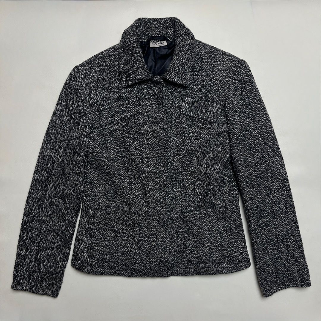 Miu Miu Black and White Wool Jacket (Category: Coats, Jackets and Outerwear) located in Caloocan City. Submitted by achilles_grails (Listing ID 1470603315, Image 1). Description: - Brand: Miu Miu - Origin: Made in Italy - Size: 36 - Material: 75% virgin wool, 20% nylon, 5% cashmere blend - Color: Black and white tweed - Lining: Fully lined in black - Details: Collar neckline, front pockets, button closure - Condition: Excellent luxury find.
