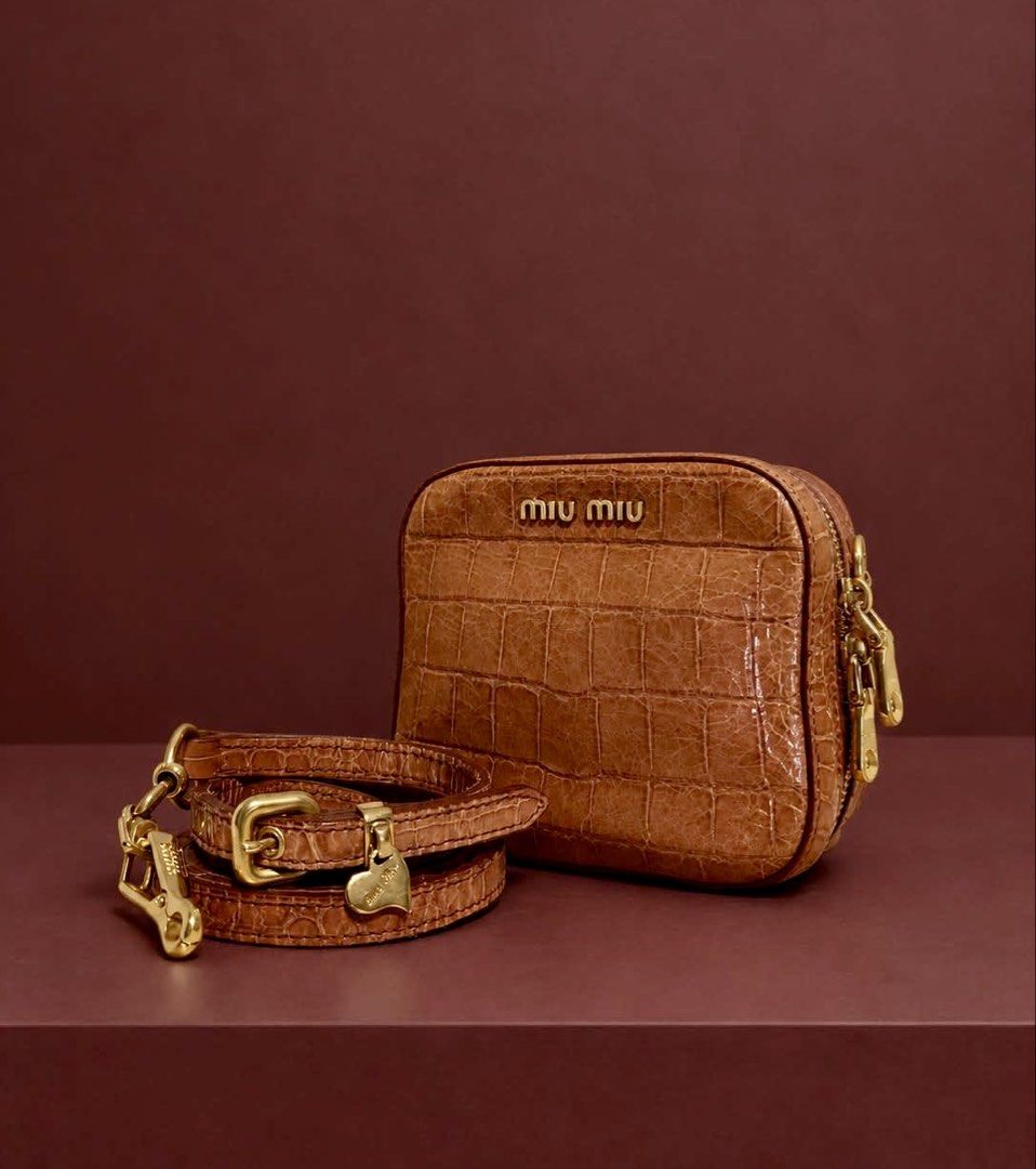 MIU MIU Croc Embossed Mini Crossbody Bag (Category: Cross-body Bags) located in Bacoor. Submitted by imluckycat (Listing ID 1470702532, Image 1). Description: Rank: BC Inclusion(s): NA L:12cm H:11cm D:6.5cm Last price posted .