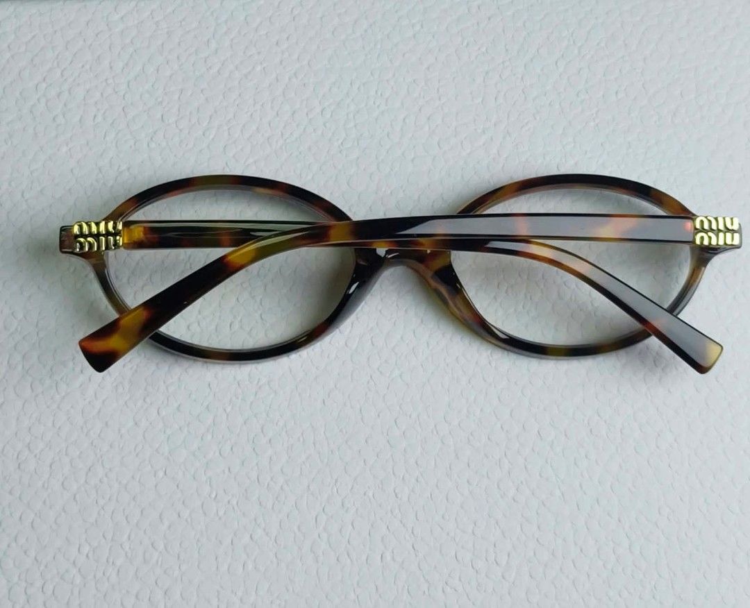 Miu Miu Tortoiseshell Oval Eyeglasses (Category: Sunglasses & Eyewear) located in Manila. Submitted by cleerview (Listing ID 1470741664, Image 1). Description: Miu Miu Oval Eyeglasses ✅ Replaceable lens ✅ High Quality ✅ with Anti Blue Light ✅ Coded ✅ Tortoise shell frame ❕❕New stock, not secondhand.