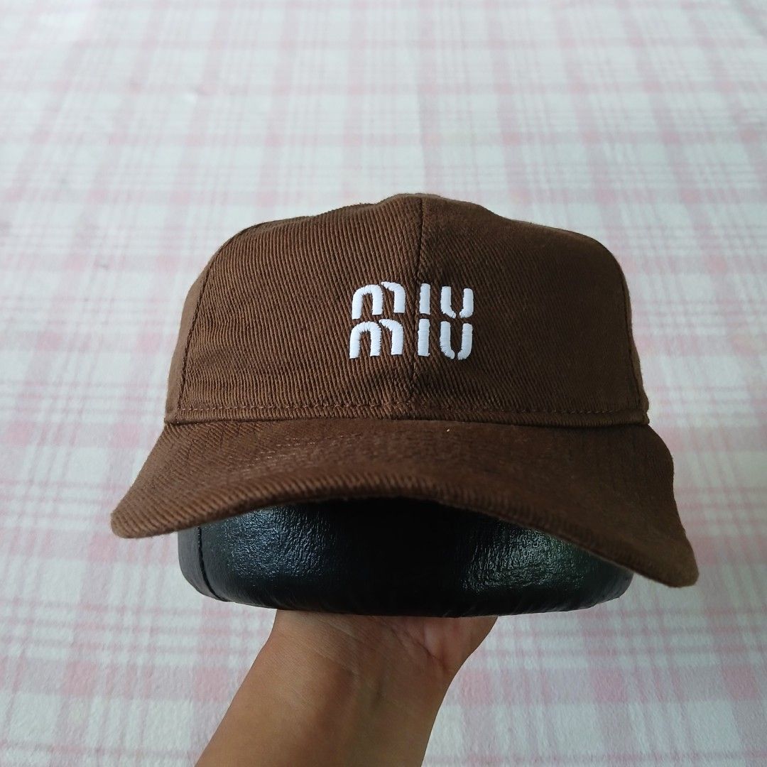MiuMiu Logo Cotton/Denim Baseball Cap (Category: Caps & Hats) located in Mangaldan. Submitted by used2.wear (Listing ID 1470667129, Image 1). Description: Excellent To As New Condition No Issue Size OSFM Kindly Check All Posted Pictures.