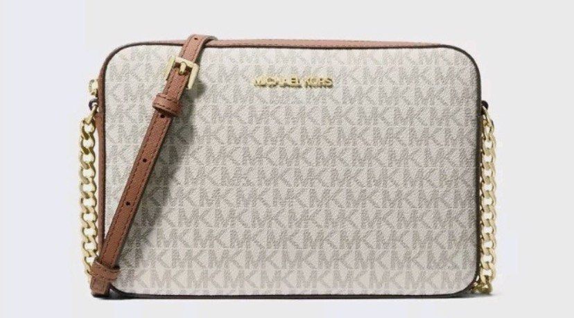 💯mk jet set vanilla sling bag (Category: Luxury Bags & Wallets) located in San Luis. Submitted by scarlet012 (Listing ID 1470674983, Image 2). Description: 💯guaranteed original sealed and brandnew with tag carcard and paper bag bought in US mk outlet.