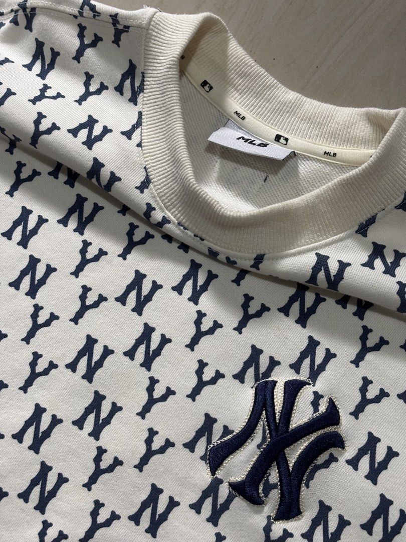 MLB New York Yankees Monogram Sweatshirt (Category: Coats, Jackets and Outerwear) located in Caloocan City. Submitted by angelocas (Listing ID 1470659777, Image 2). Description: MLB Yankees Monogram Sweatshirt Color: cream white, navy blue authentic 9.5/10 condition size small on tag dimes: 19x25.