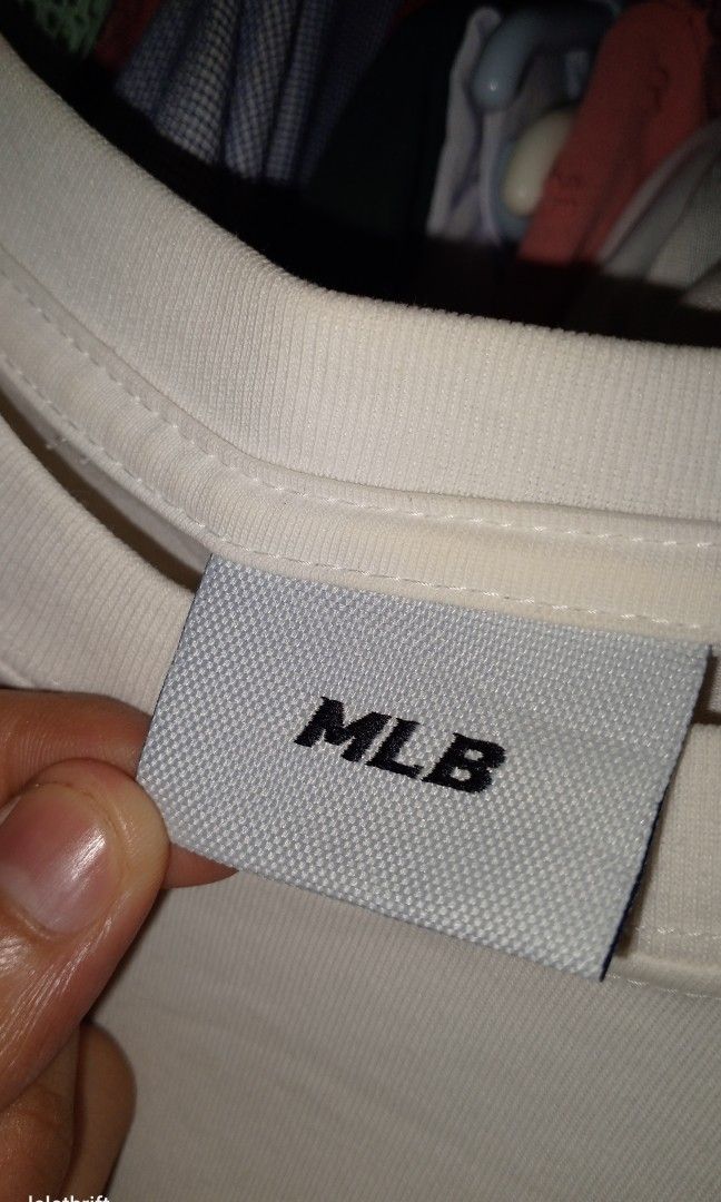 MLB NY t-shirt (Category: Tshirts & Polo Shirts ) located in Batangas. Submitted by lelethrift.com (Listing ID 1470713021, Image 3). Description: size: Medium fits Authentic! Excellent to brand new condition patch minimal design sa front Embossed print backhit no issue, 10/10 color rate no yellow stains complete tags with washtag.