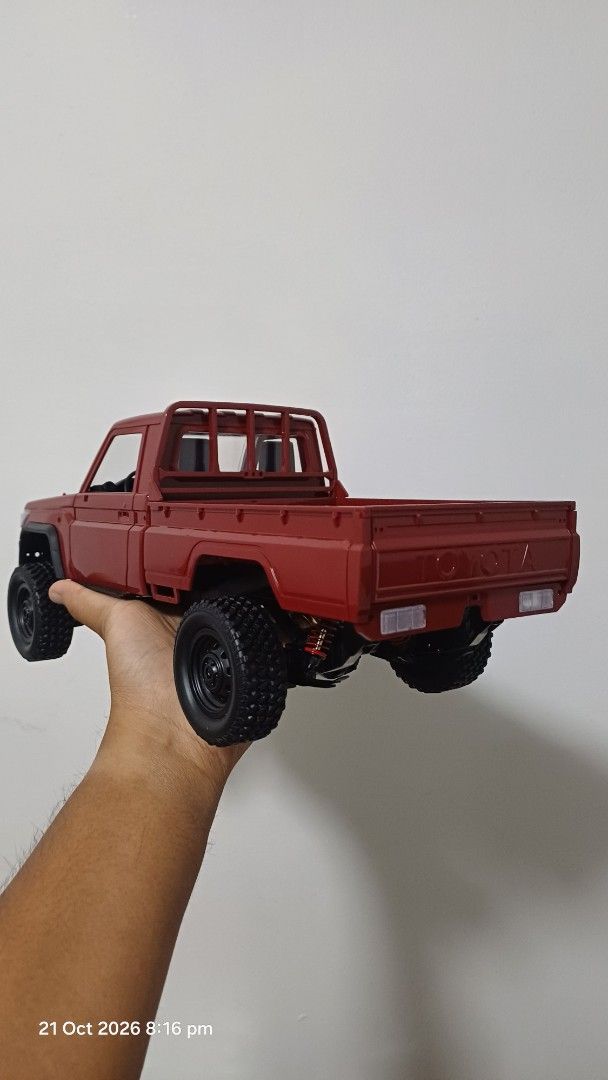 MN82 RED BASE VARIANT 1:12 Scale HOBBY GRADE RC CRAWLER (Category: Remote Control Toys) located in Subic. Submitted by kennethp. (Listing ID 1470658044, Image 2). Description: Brand New MN 82 Model 1:12 scale Toyota 4x4 RC truck in red. 2.4 GHz remote control system. Detailed pickup truck body, black wheels, off-road tires. Complete with box and accessories. .