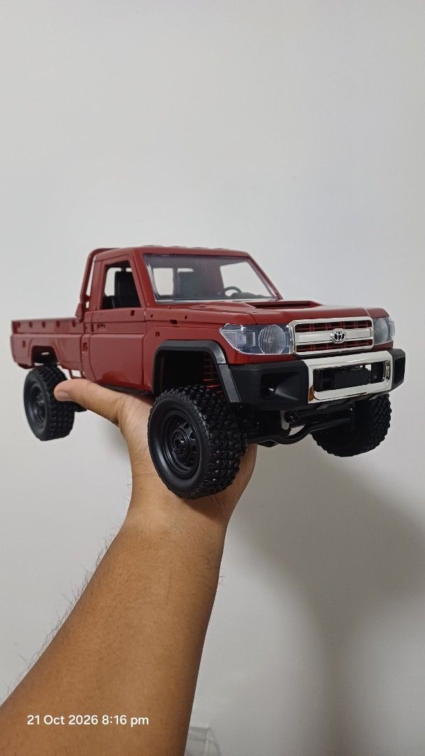 MN82 RED BASE VARIANT 1:12 Scale HOBBY GRADE RC CRAWLER (Category: Remote Control Toys) located in Subic. Submitted by kennethp. (Listing ID 1470658044, Image 1). Description: Brand New MN 82 Model 1:12 scale Toyota 4x4 RC truck in red. 2.4 GHz remote control system. Detailed pickup truck body, black wheels, off-road tires. Complete with box and accessories. .