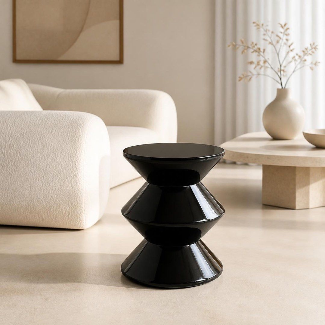 Modern geometric accent stool side table (Category: Chairs) located in Pasig City. Submitted by jk_rldn (Listing ID 1470562539, Image 1). Description: - Unique hourglass shape with three stacked geometric tiers - Glossy, light-reflecting, pristine finish - Heavy-duty plastic build suitable as a side table or extra seat - Smooth flat top safely holds drinks and small decor - Clean minimalist design ideal for contemporary spaces.