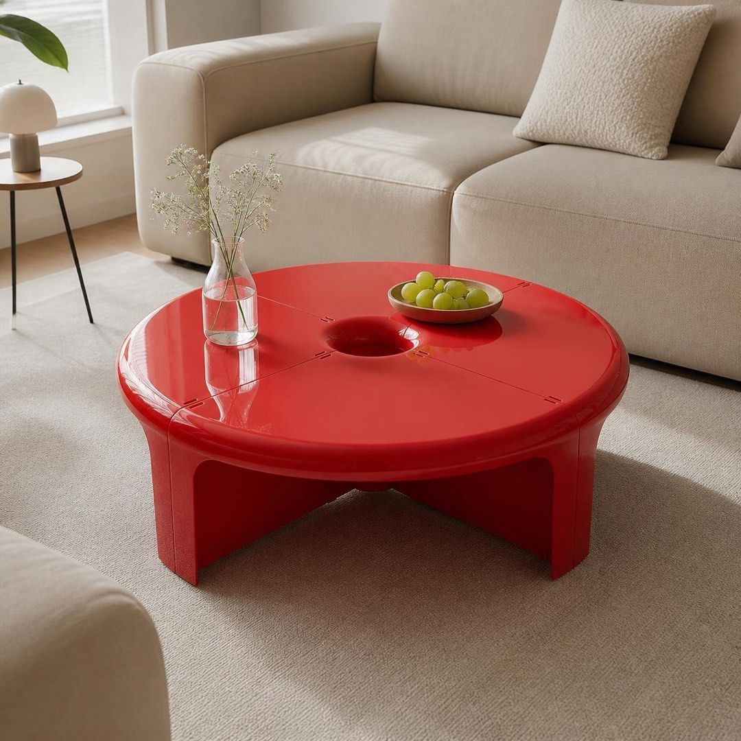 Modern Round Modular Coffee Table (Category: Tables & Sets) located in Pasig City. Submitted by jk_rldn (Listing ID 1470561513, Image 2). Description: - 4-piece modular design: clicks together securely in the center - Stylish material: glossy molded plastic/acrylic with a trendy central cutout hole - Low-profile height: sits perfectly on living room rugs - Low maintenance: smooth surface wipes clean easily - Available in yellow, red, and white.