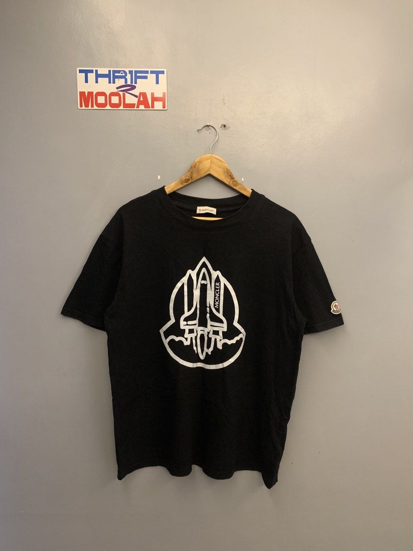 MONCLER ENFANT BLACK ROCKET GRAPHIC TEE (Category: Tshirts & Polo Shirts ) located in Cavite. Submitted by thrift2moolah (Listing ID 1470612899, Image 1). Description: MONCLER ENFANT BLACK ROCKET GRAPHIC TEE XL on tag 22/27 Excellent condition 9/10 Color rate minimal hairline 600 plus sf.