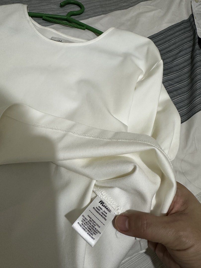 Mosaic White Puff Sleeve Top (Category: Blouses) located in Balanga. Submitted by jamilbeauty5 (Listing ID 1470737699, Image 3). Description: - Brand: Mosaic - Color: White - Style: Short sleeve top with cute puff sleeves and rounded neckline - Condition: Clean overall - Care: Hand wash cold recommended - Versatile piece, easy to match with jeans or skirts - guaranteed authentic, bought from store. - brand new, washed but NOT worn.