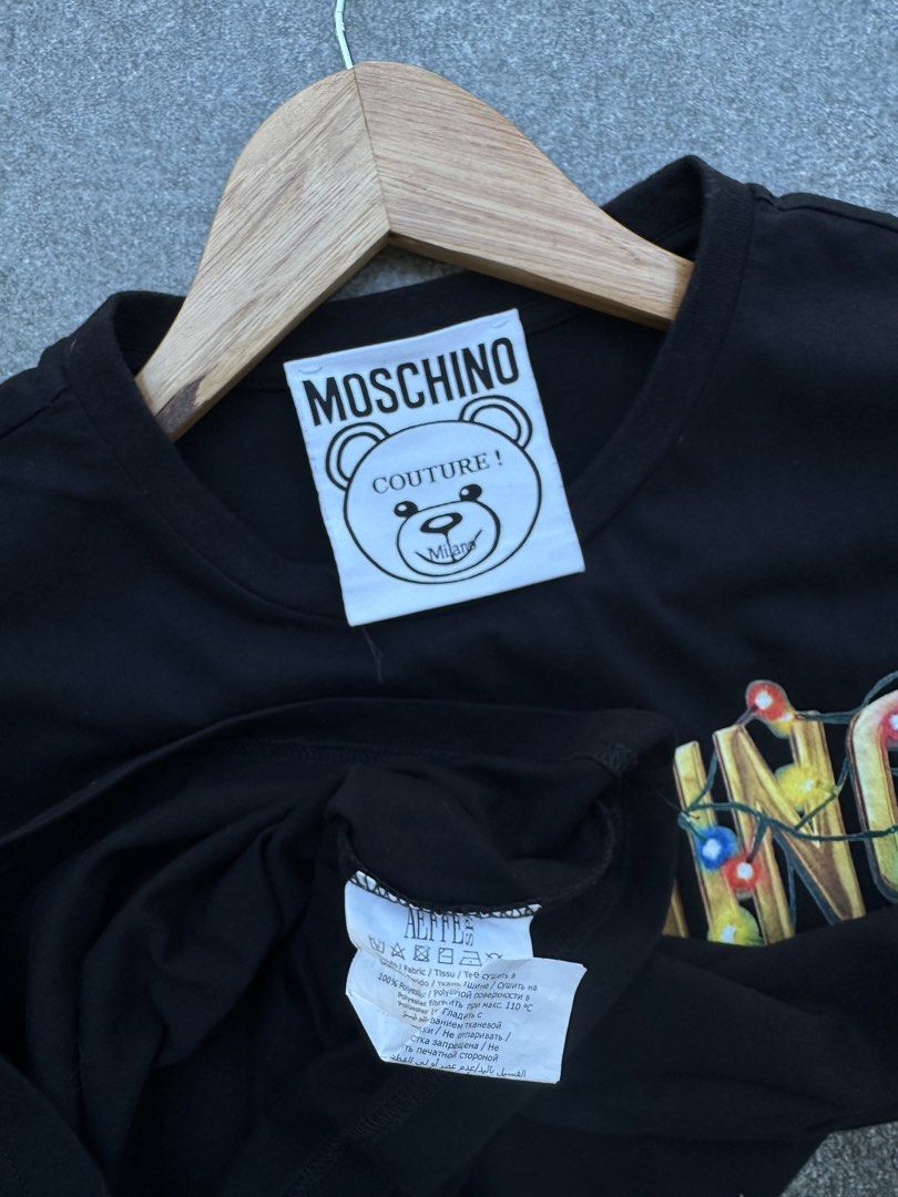 MOSCHINO - Christmas Lights Bear Tee (Category: Shirts) located in Cavite. Submitted by hand.picked (Listing ID 1470587277, Image 3). Description: MOSCHINO - Christmas Lights Bear Tee Size: Medium Dimension: 18” Width / 25” Length Condition: Like New.