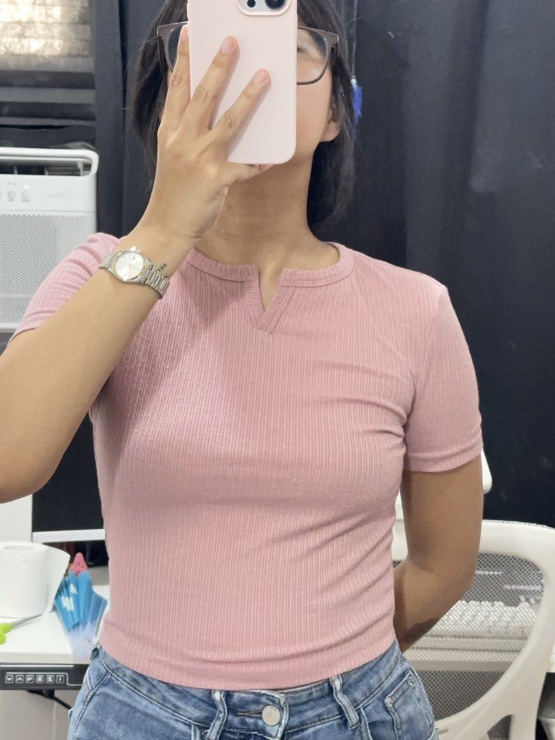 MOTF Pink Ribbed Tee (Category: Shirts) located in Las Pinas. Submitted by __aqdclttrs (Listing ID 1470619152, Image 3). Description: - Brand: MOTF - Color: Dusty pink - Size: XS - Style: Slim fit ribbed knit top with short sleeves and notched neckline - Material: 92% polyester, 8% elastane (super stretchy) - Condition: Great for pairing with high-waisted jeans.
