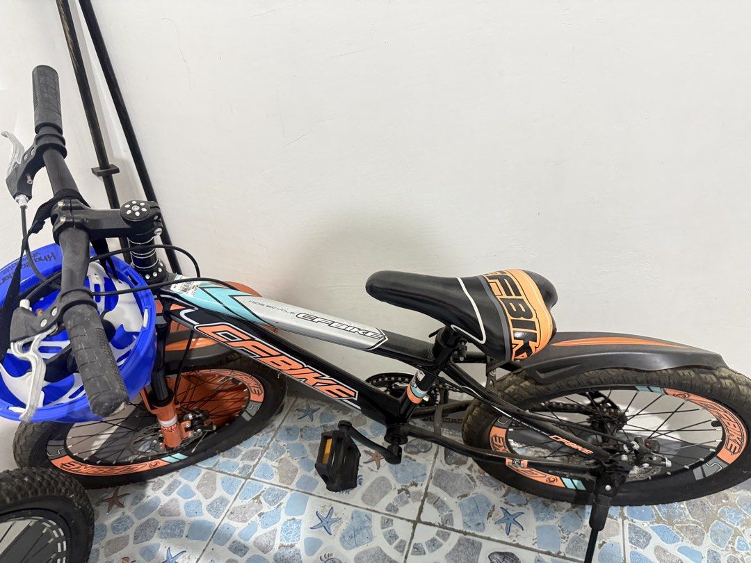 Mountain Bike and Floor Pump Set (Category: Bicycles) located in Manila. Submitted by hazeleran030614 (Listing ID 1470639578, Image 2). Description: - Bundle includes: 2 mountain bikes and 1 black floor pump - Bike 1: Black and red with suspension forks and disc brakes - Bike 2: Black and orange with suspension forks and disc brakes - Floor pump: Includes a convenient pressure gauge at the base - Ideal for: Weekend trail rides and daily commuting