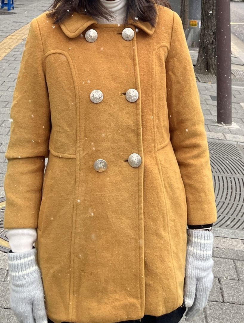 Mustard Yellow Double Breasted Wool Coat with Silver Buttons (Category: Coats, Jackets and Outerwear) located in Manila. Submitted by jira____ (Listing ID 1470683914, Image 2). Description: Mustard yellow wool coat, double breasted style. Features shiny silver tone buttons down the front and on the collar. Structured seaming detail along the front panels and waistline. Long sleeves with finished cuffs. Hits around mid thigh length. Warm winter pi