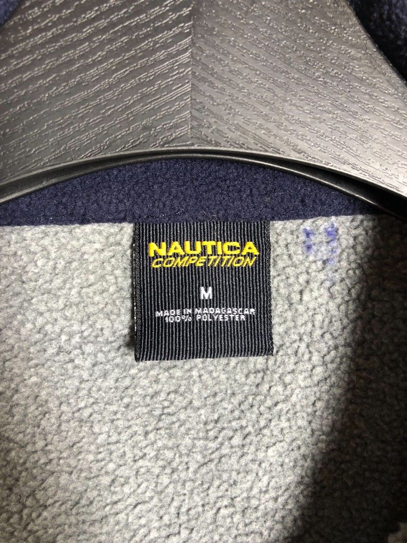 Nautica Competition Quarter-Zip Fleece Pullover (Category: Coats, Jackets and Outerwear) located in Manila. Submitted by silentwolf_3303a7 (Listing ID 1470559644, Image 3). Description: * Color: Heather Grey * Size: Medium (28" Length x 24" Width) * Condition: 10/10 (Good as new / No Flaws) 📌 DM to purchase! Perfect 90s vintage prep look..