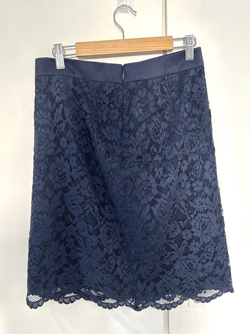 Navy Blue Lace Knee Length Skirt (Category: Skirts) located in Manila. Submitted by isabelle_1104 (Listing ID 1470672053, Image 2). Description: - Color: Classic Navy Blue - Style: Elegant pencil cut with a feminine scalloped hem - Details: Smooth satin waistband and secure back zipper closure - Versatility: Perfect for the office, formal events, or evening outings - Condition: Pre-loved, well-maintained, and ready for a new home - Mode of Paymen