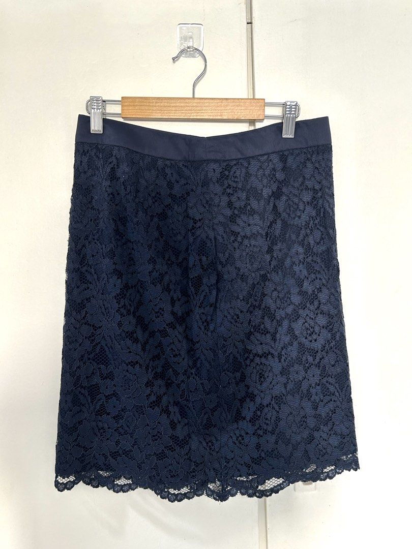 Navy Blue Lace Knee Length Skirt (Category: Skirts) located in Manila. Submitted by isabelle_1104 (Listing ID 1470672053, Image 1). Description: - Color: Classic Navy Blue - Style: Elegant pencil cut with a feminine scalloped hem - Details: Smooth satin waistband and secure back zipper closure - Versatility: Perfect for the office, formal events, or evening outings - Condition: Pre-loved, well-maintained, and ready for a new home - Mode of Paymen
