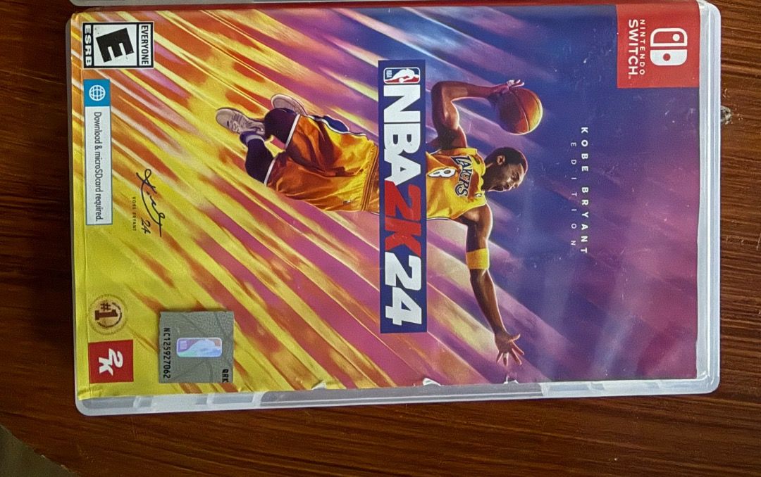 NBA 2K24 Nintendo Switch (Category: Nintendo) located in Bulacan. Submitted by HomeProductsMNL (Listing ID 1465037882, Image 1). Description: - NBA 2K24 Kobe Bryant Edition (Nintendo Switch) - Condition: Tested and 100% working - Includes: Original cartridges, cases, inserts, and manuals - Case condition: Clean, no cracks or heavy scratches - Reason for selling: Finished playing, clearing out backlog.