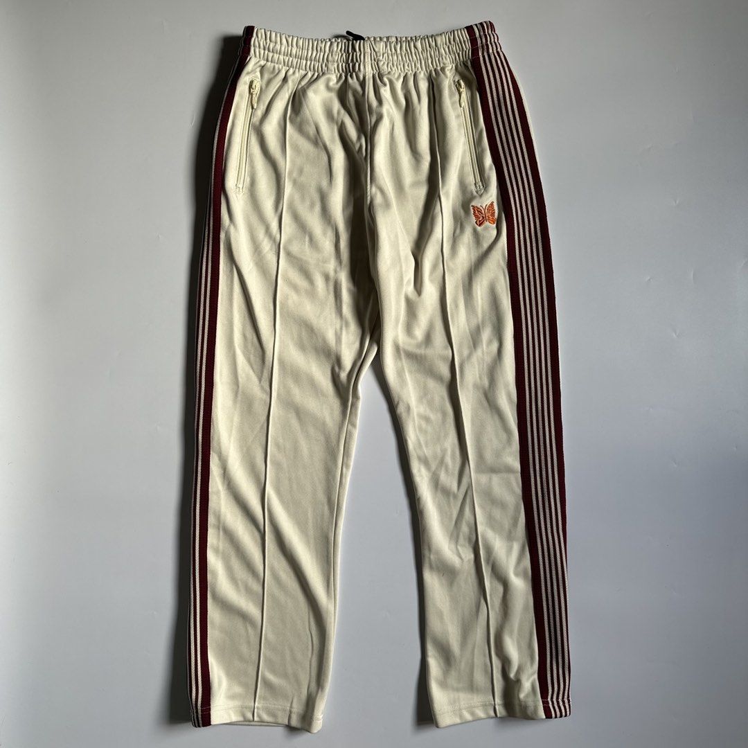 Needles Track Pants Ivory (Category: Joggers) located in Calamba. Submitted by secondsite.ph (Listing ID 1470619925, Image 1). Description: Needles Track Pants Ivory Size Large on tag (30-34) 10/10 like new No flaws ₱1580.