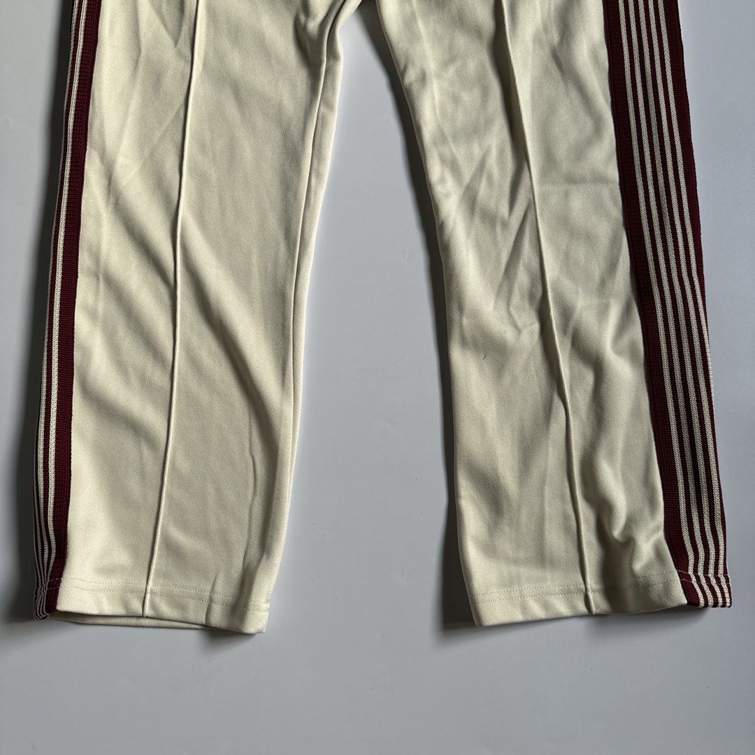 Needles Track Pants Ivory (Category: Joggers) located in Calamba. Submitted by secondsite.ph (Listing ID 1470619925, Image 3). Description: Needles Track Pants Ivory Size Large on tag (30-34) 10/10 like new No flaws ₱1580.
