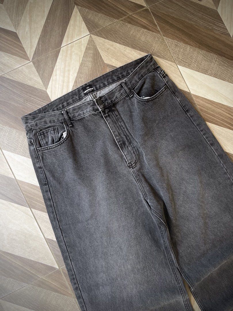 NEUKKIMPYU Black Stonewashed Baggy Jeans (Category: Jeans) located in Pagadian. Submitted by thrift.wrld (Listing ID 1470650582, Image 2). Description: ( NEUKKIMPYU Black Stonewashed Baggy Jeans ) Dimensions: • Waist: 35 • Length: 42.5 • Thigh: 14.5 • Hem: 11 Drop Prices: • Mine: 400 + ₱9O shipping fee (sf) Details: • 1O/1O Color rate • Flawless, As new condition with zero flaws • Need wash • Hard Denim.